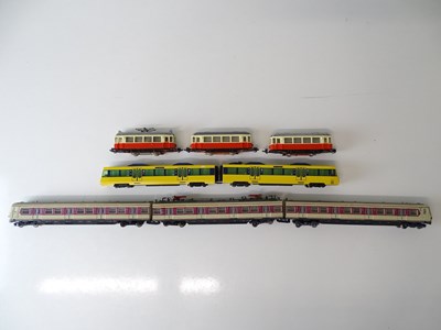 Lot 164 - A group of unboxed tram cars by HAMO and HODL...