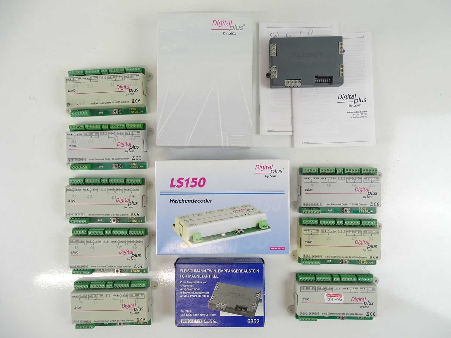 Lot 167 - A large group of DCC accessory decoders by