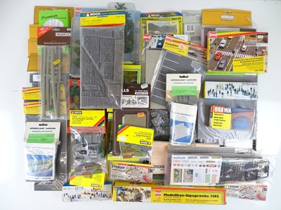 Lot 168 - A large group of HO Scale building and scenery...