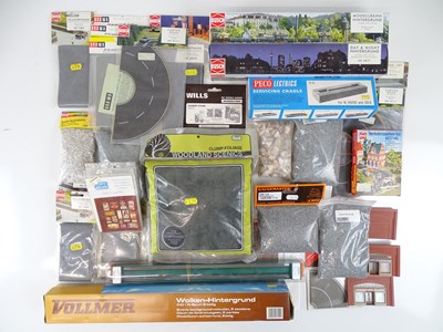 Lot 169 - A large group of HO Scale building and scenery...