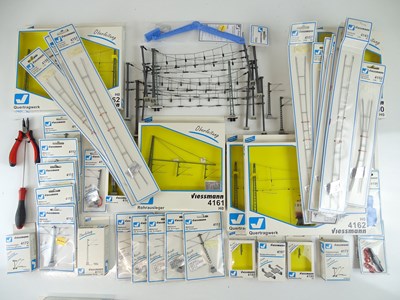 Lot 173 - A large quantity of HO Scale catenary, masts...