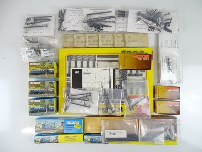 Lot 174 - A large quantity of HO Scale catenary, masts...