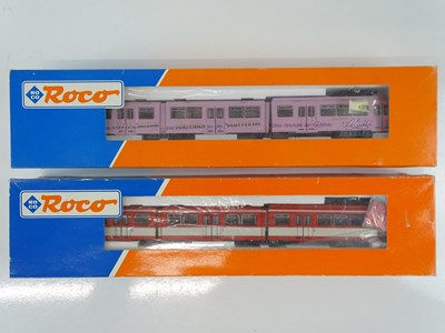 Lot 187 - A pair of HO Gauge ROCO Düwag trams comprising...