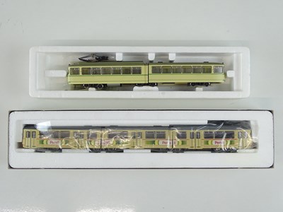 Lot 188 - A pair of HO Gauge ROCO Düwag trams comprising...