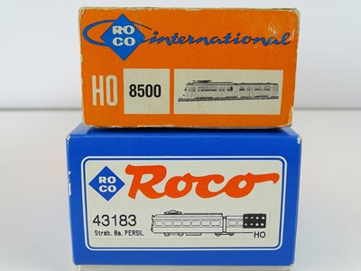 Lot 188 - A pair of HO Gauge ROCO Düwag trams comprising...