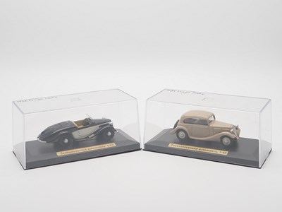 Lot 233 - A pair of 1:43 scale hand built resin models...