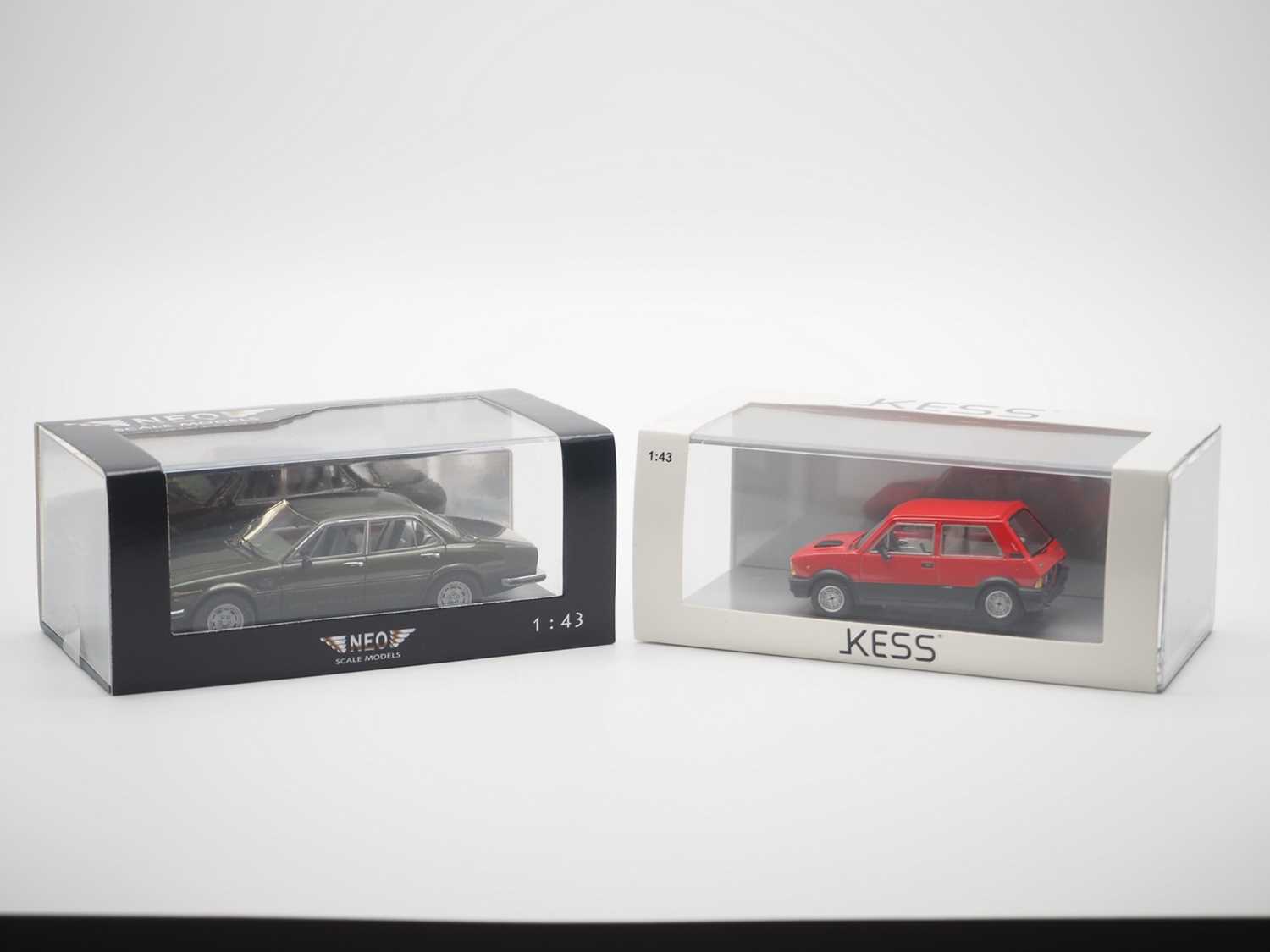 Lot 25 - A pair of hand built 1:43 scale resin models...