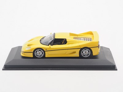 Lot 26 - A group of 1:43 scale models by MINICHAMPS,...