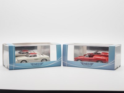 Lot 273 - A pair of 1:43 scale hand built resin models...