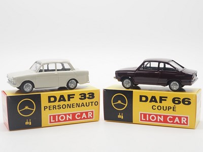 Lot 282 - A group of 1:43 scale models by LION TOYS, and...