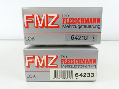 Lot 207 - A pair of HO Gauge German Outline diesel...