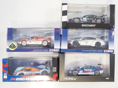 Lot 386 - A group of 1:43 scale models by MINICHAMPS,...