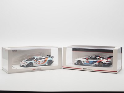 Lot 392 - A pair of 1:43 scale hand built resin models...