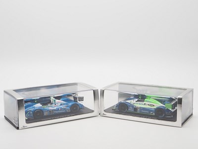 Lot 443 - A pair of 1:43 scale hand built resin models...