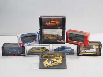 Lot 95 - A group of 1:43 scale boxed and unboxed models...