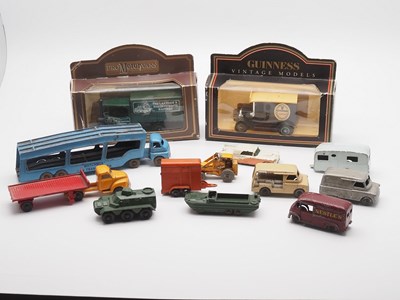 Lot 121 - A group of MATCHBOX early 1-75 series cars in...