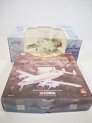 Lot 13 - A pair of diecast model planes comprising a...