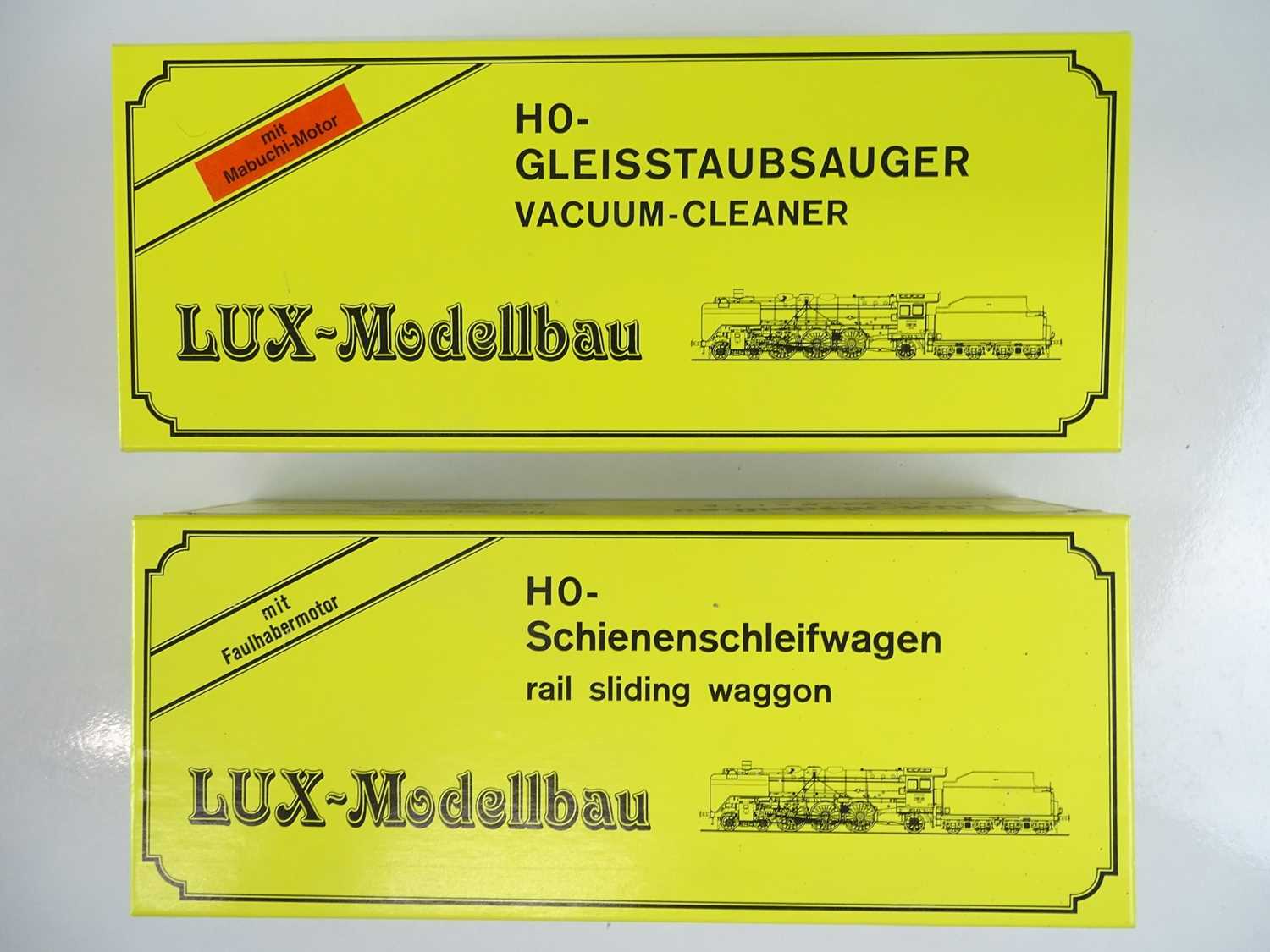 Lot 231 - A pair of HO Gauge rail and track cleaning...