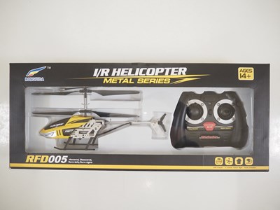 Lot 152 - A modern radio controlled helicopter toy,...