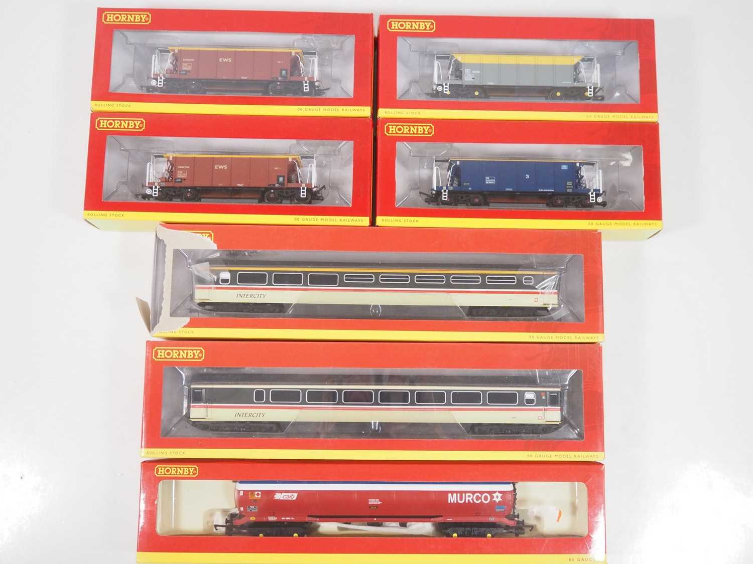 Lot 242 - A group of HORNBY OO gauge rolling stock...