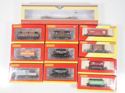 Lot 243 - A mixed group of OO gauge wagons by HORNBY and...