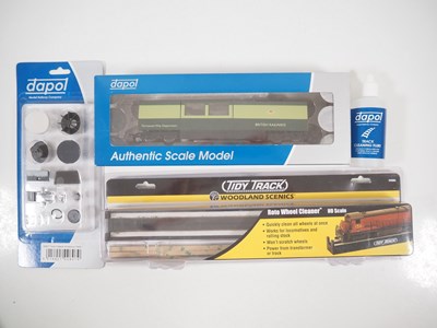 Lot 438 - A group of OO gauge track and wheel cleaning...