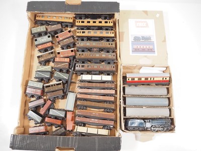 Lot 460 - A large quantity of TRIX TWIN OO gauge unboxed...