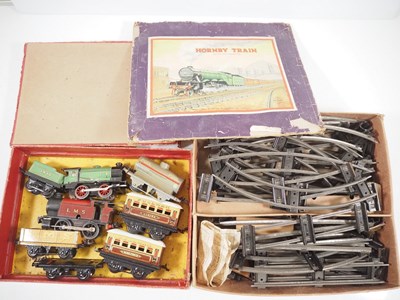 Lot 527 - A quantity of HORNBY SERIES O gauge clockwork...