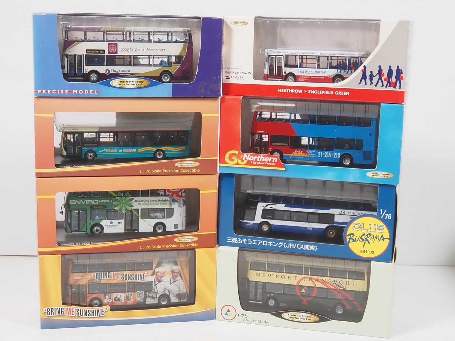 Lot 6 - A group of 1:76 scale diecast buses by