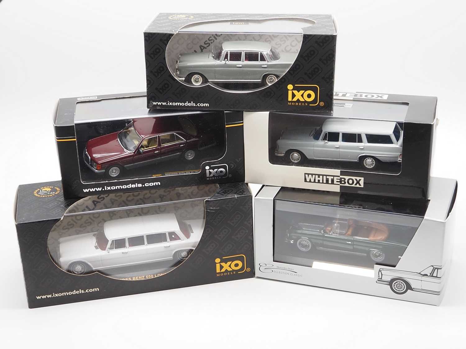 Lot 128 - A group of 1:43 scale models by IXO, FALLER...