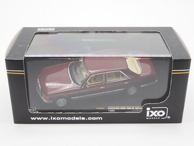 Lot 128 - A group of 1:43 scale models by IXO, FALLER...