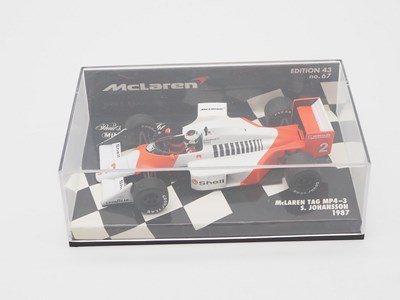 Lot 201 - A group of 1:43 scale Formula 1 race cars by...