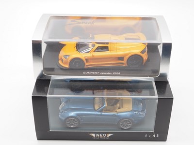 Lot 30 - A pair of hand built resin 1:43 scale models...