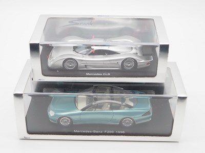 Lot 48 - A pair of hand built resin 1:43 scale models...