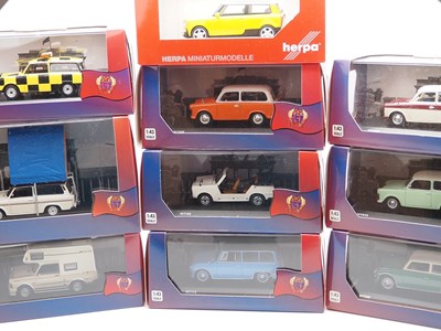 Lot 104 - A group of 1:43 scale IST (IXO) and HERPA,...