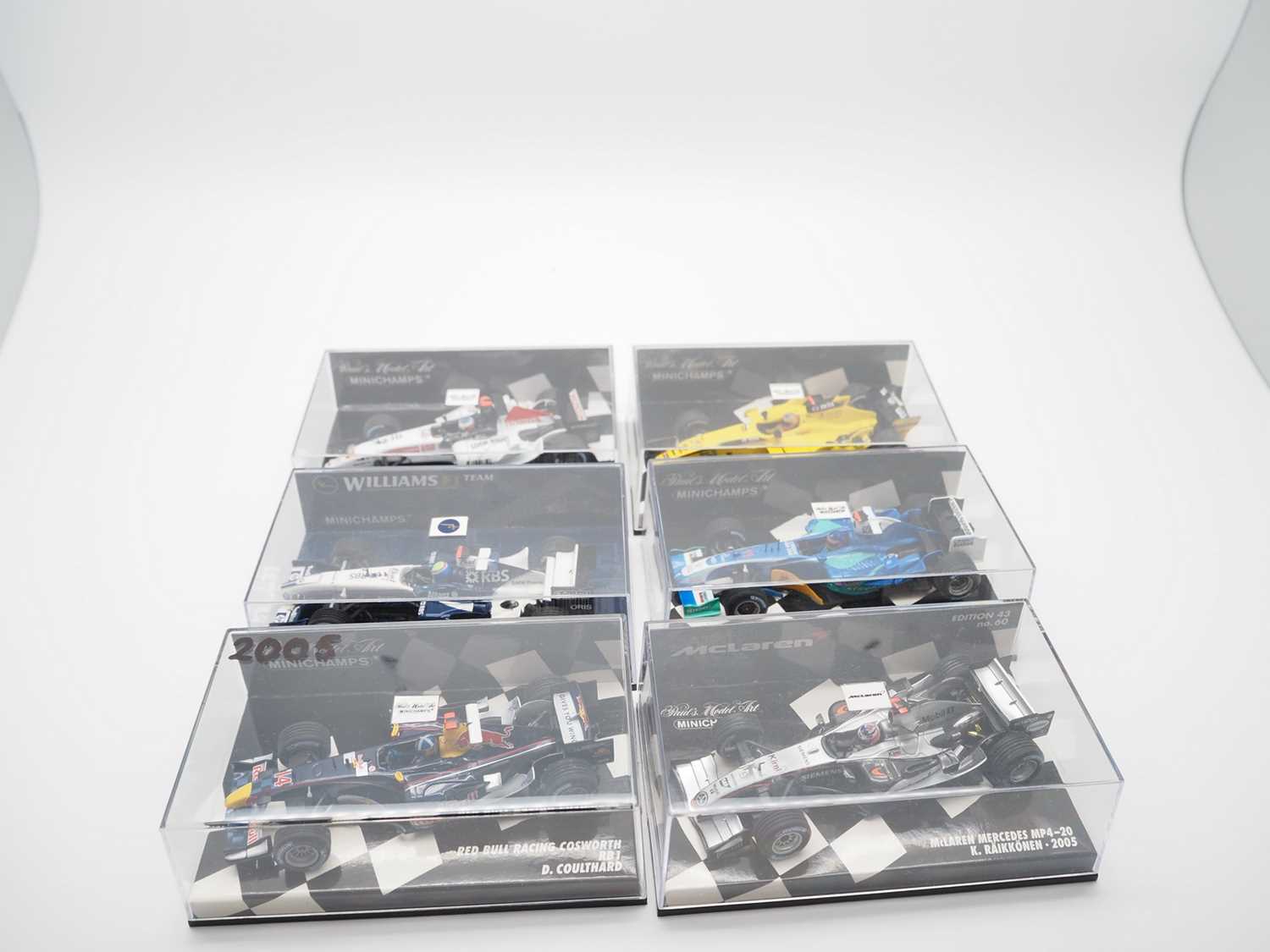 Lot 207 - A group of 1:43 scale Formula 1 race cars by...