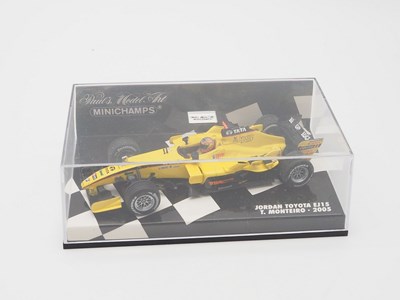 Lot 207 - A group of 1:43 scale Formula 1 race cars by...