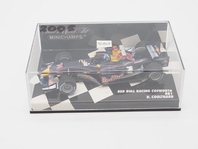 Lot 207 - A group of 1:43 scale Formula 1 race cars by...