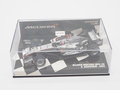 Lot 207 - A group of 1:43 scale Formula 1 race cars by...