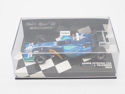 Lot 207 - A group of 1:43 scale Formula 1 race cars by...