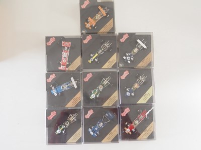 Lot 221 - A group of 1:43 scale Formula 1 race cars by...