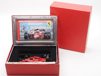 Lot 224 - A group of 1:43 scale Formula 1 race cars by...