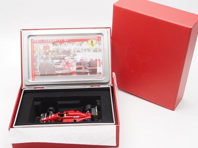 Lot 224 - A group of 1:43 scale Formula 1 race cars by...