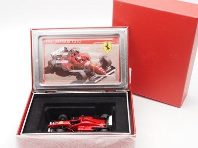 Lot 224 - A group of 1:43 scale Formula 1 race cars by...