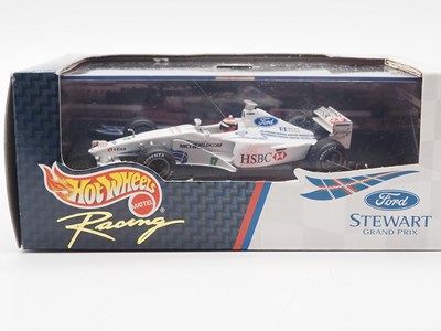 Lot 233 - A group of 1:43 scale Formula 1 race cars by...