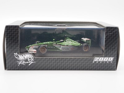 Lot 233 - A group of 1:43 scale Formula 1 race cars by...