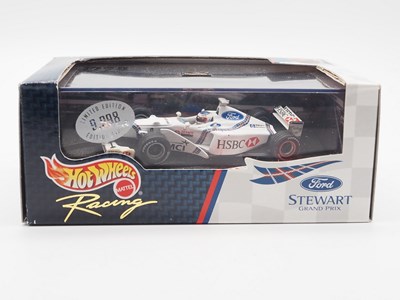 Lot 233 - A group of 1:43 scale Formula 1 race cars by...