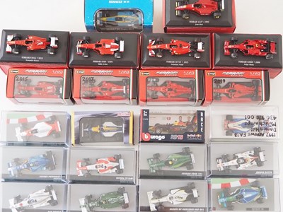 Lot 234 - A large group of boxed and unboxed 1:43 scale...