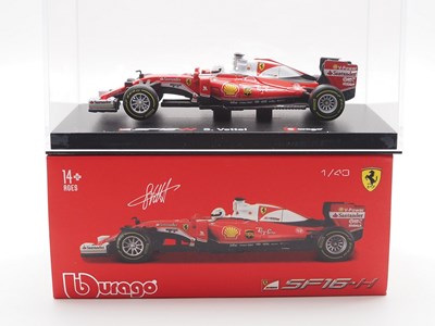 Lot 235 - A group of 1:43 scale Formula 1 race cars by...