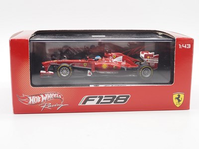 Lot 235 - A group of 1:43 scale Formula 1 race cars by...